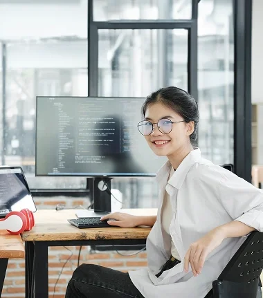 A Girl Smiling while working