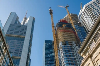 Skyscrapers under construction representing scalable and evolving enterprise structures
