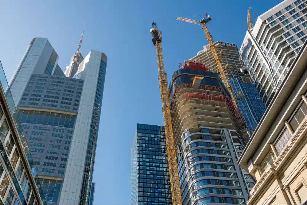 Skyscrapers under construction representing scalable and evolving enterprise structures