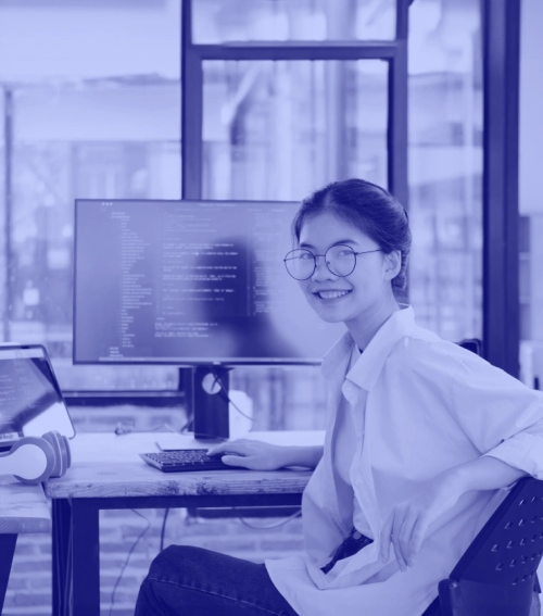 A Girl Smiling while working